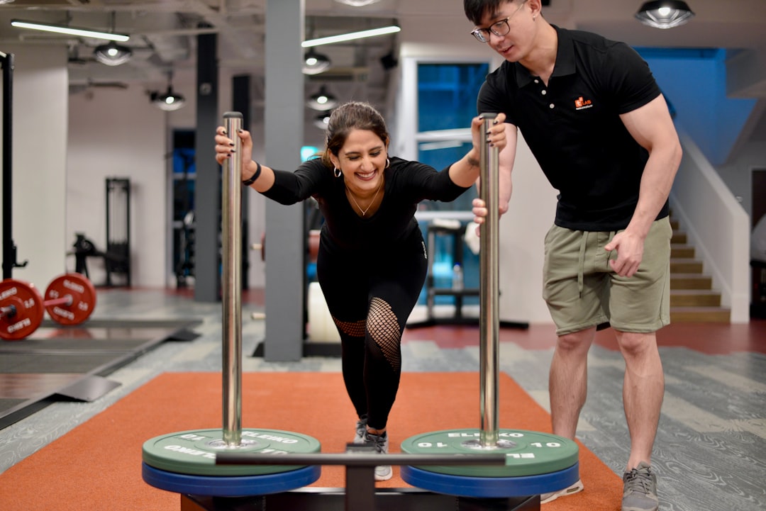 why-your-recovery-needs-comprehensive-sports-therapy-image Comprehensive sports therapy athlete performing guided rehabilitation exercises - Comprehensive sports therapy